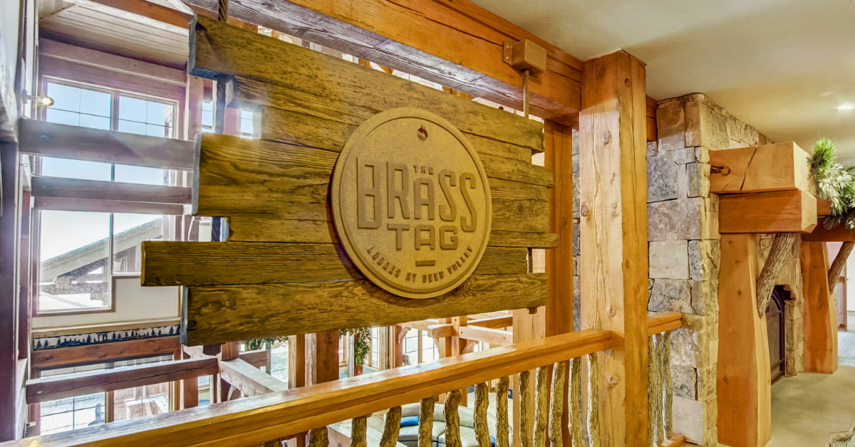 a sign on a wood wall of the Brass Tag in Deer Valley