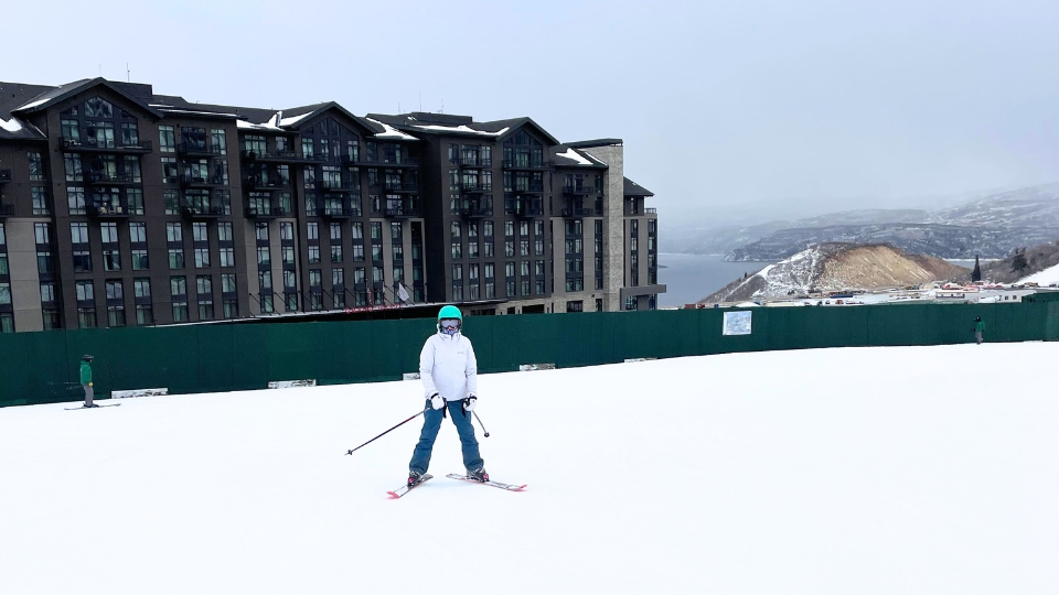 Deer Valley East Village with Jordanelle in the background and the Grand Hyatt